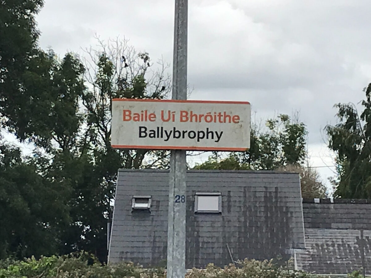 A sign saying "Ballybrophy" in English and Gaelic