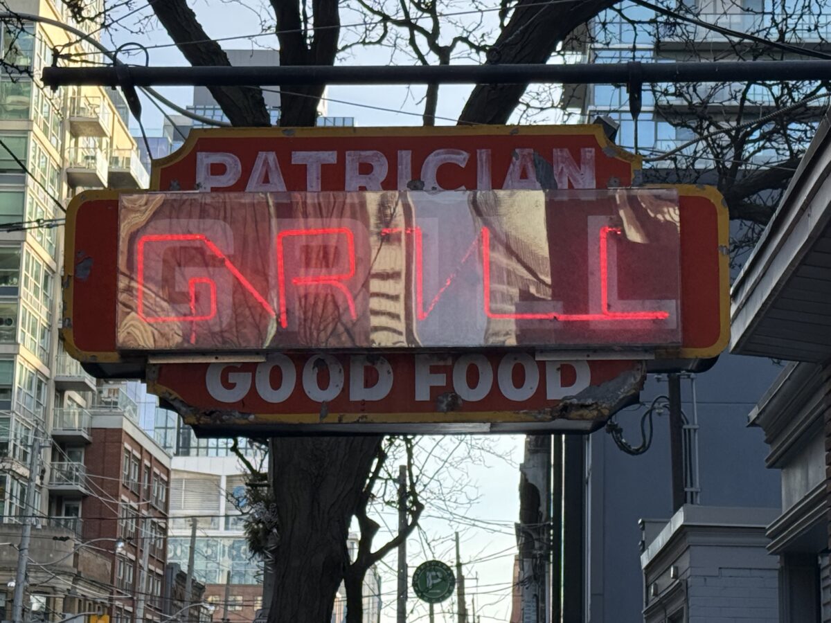 A neon sign for the Patrician restaurant